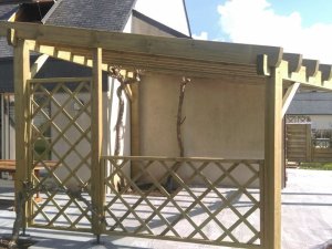 Rénovation d'une terrasse et pose d'un pergola sur mesure